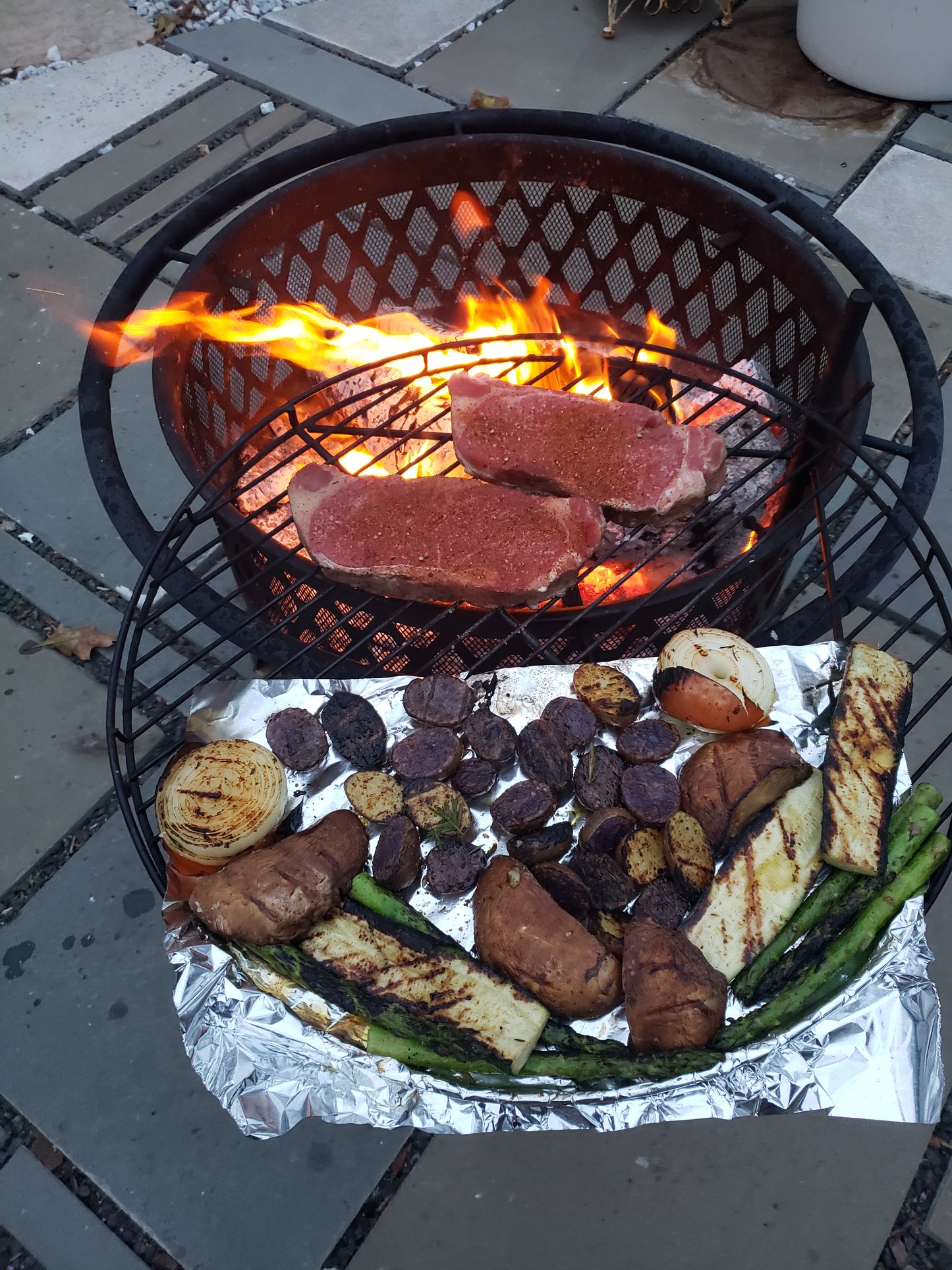 NY strip, grilled vegetables and potatoes